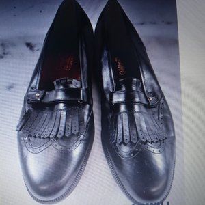 Brand:  Salvatore Ferragamo used